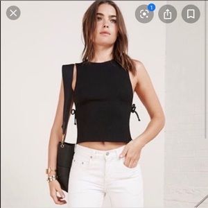 Réformation shirt with open air sides.